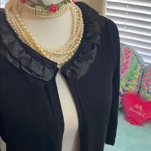 Just Taylor open front black sweater with floral neckline